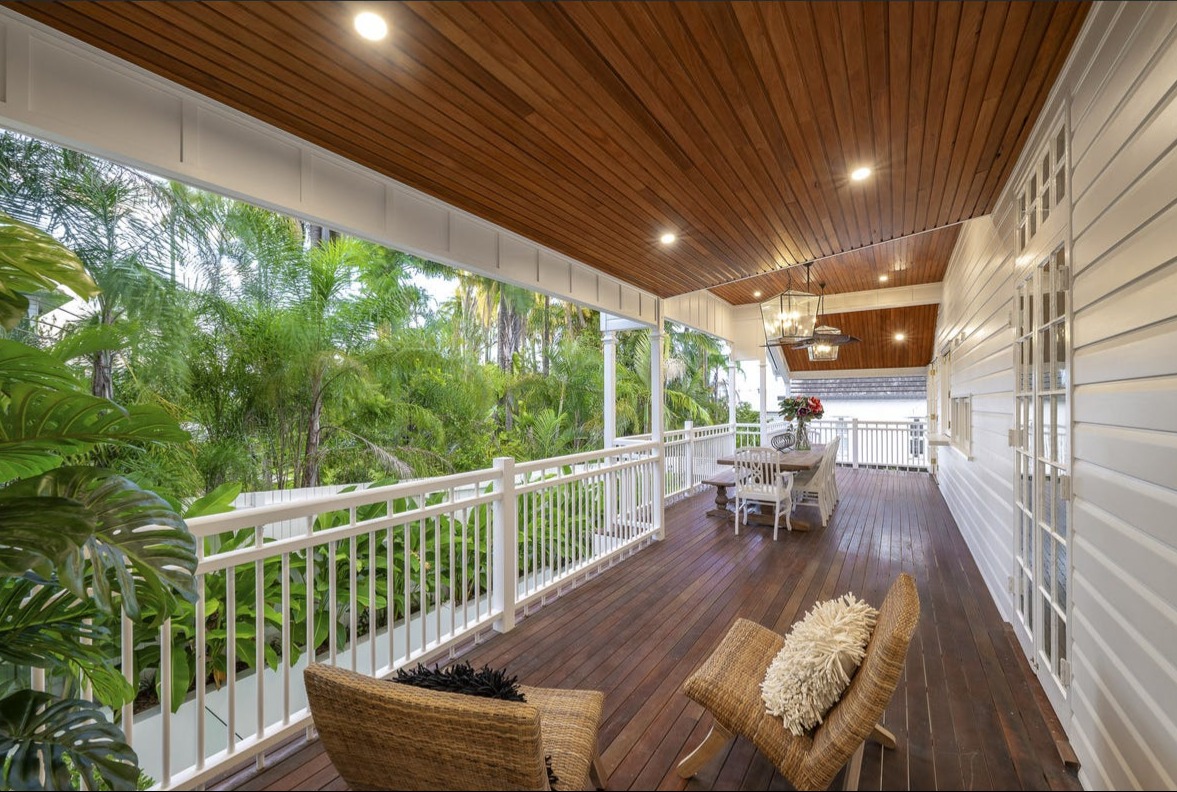 Queenslander verandah with VJ timber ceiling and tongue-and-groove floors